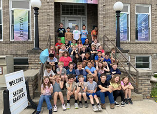 second graders visit library